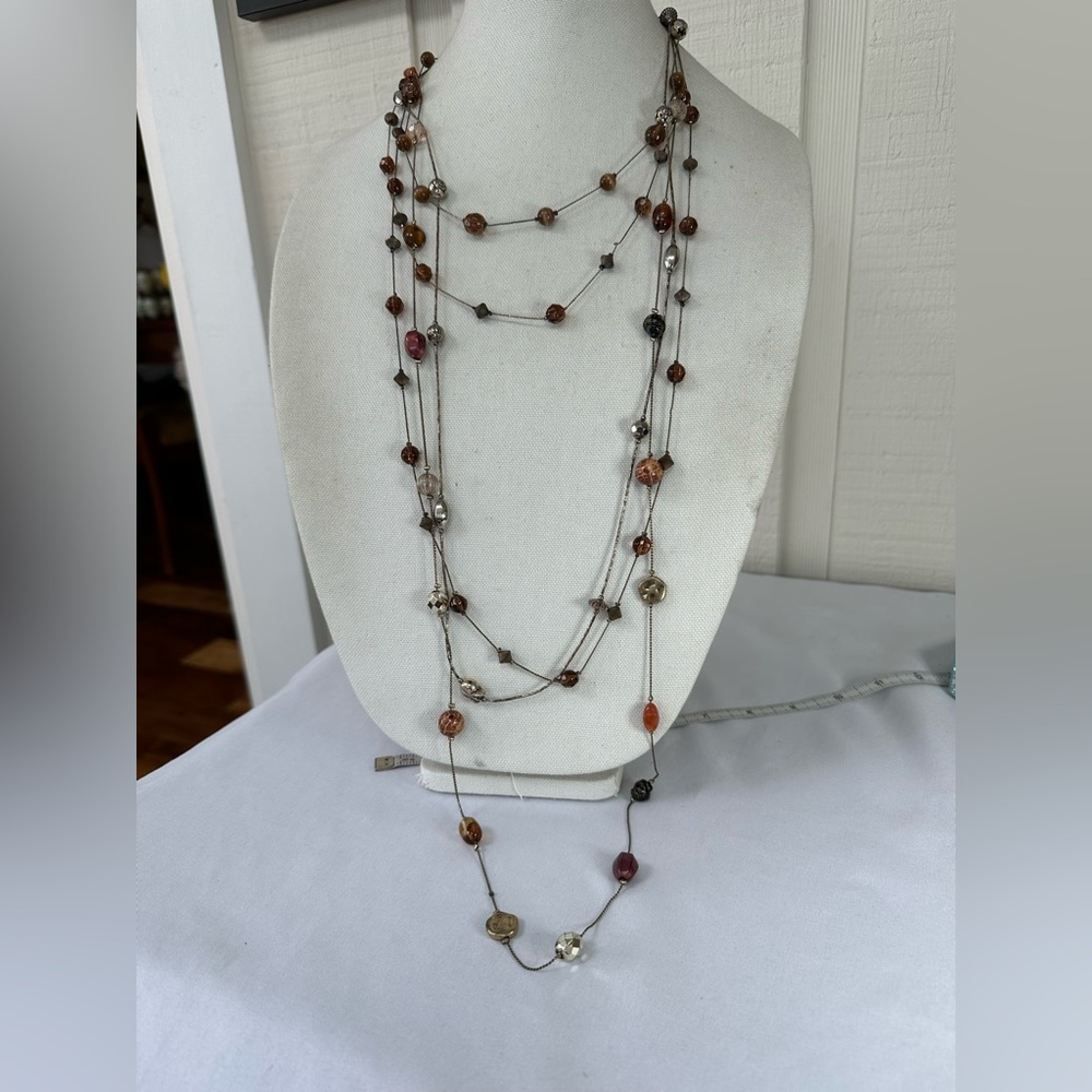 Three long station style bead necklaces